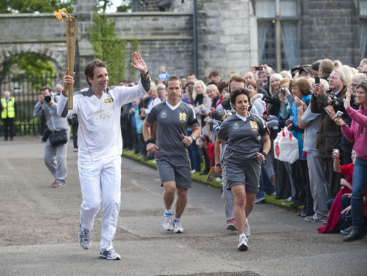Mark Beaumont with the Olympic torch