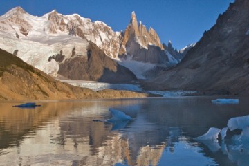 Glaciers covering the Adela and Cerro Torre massifs are reflected in the Laguna Torre, a glacial lake in Los Glacieres National Park. The South Chile water tower is the most at-risk water tower in South America due to high reliance on its water resources and increasing threats to its water supply, according to new research supported by National Geographic and Rolex’s Perpetual Planet partnership. Learn more at natgeo.com/PerpetualPlanet. Photo by Beth Wald, National Geographic.