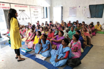 Indian woman from Saathi organisation delivering health workshop in India