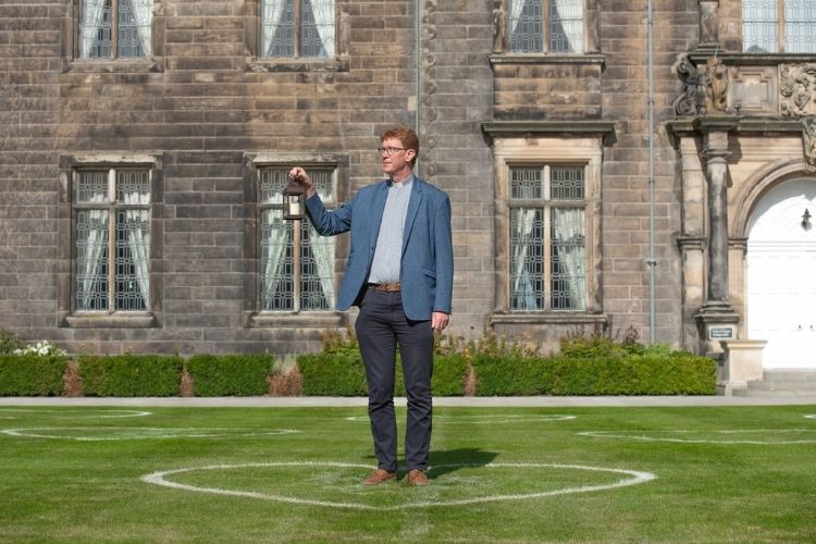 Donald standing in a heart in the quad 