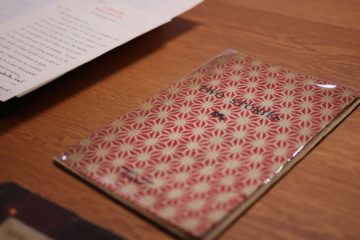 Hogarth Press publication of Woolf's 'Two Stories' closed. Cover features a red and white geometric pattern.