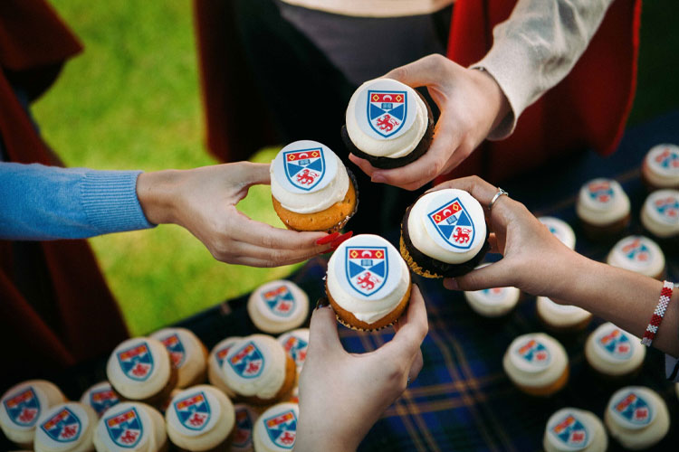 Student Ambassadors with celebration cupcakes