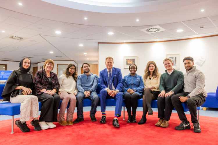 Peter Jones CBE with University of St Andrews Business School staff and students.