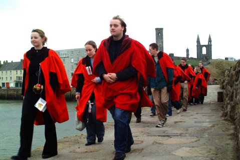 Students today doing the 'pier walk' in their red gowns.